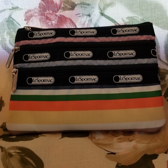 Lesportsac Handbags - Lesportsac Voyage 3 Zip Cosmetic Pouch.
